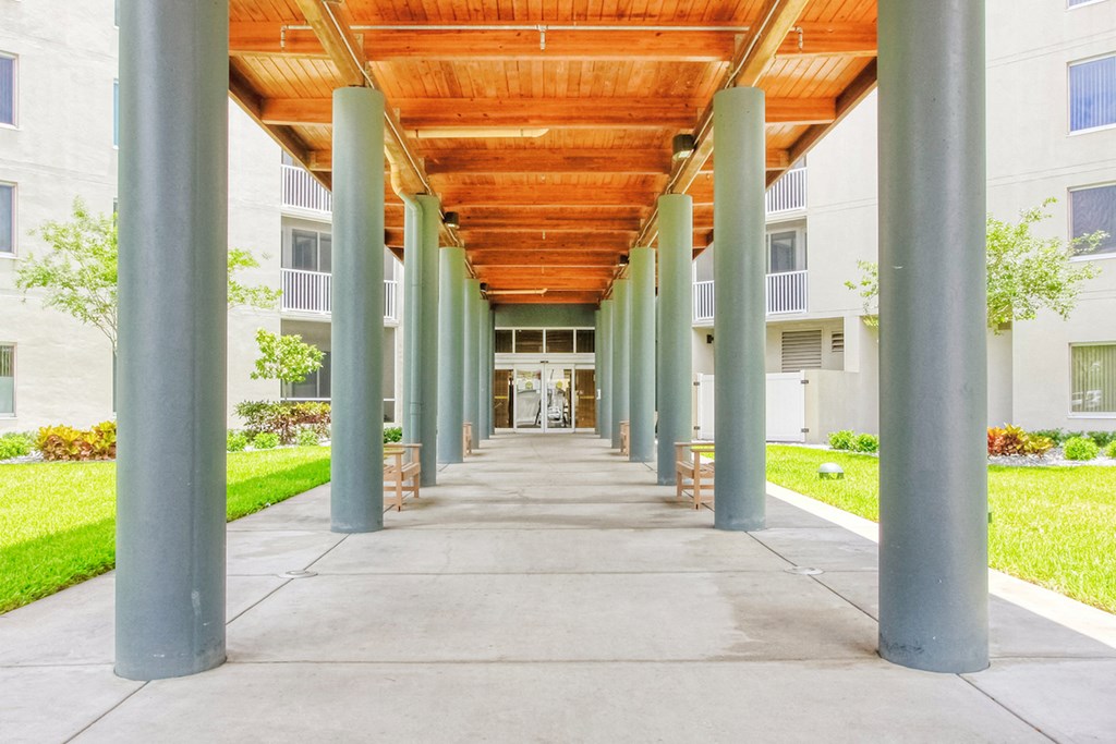 covered entrance way leading to lobby of St. Giles Manor