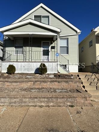 a house with stairs in front of it