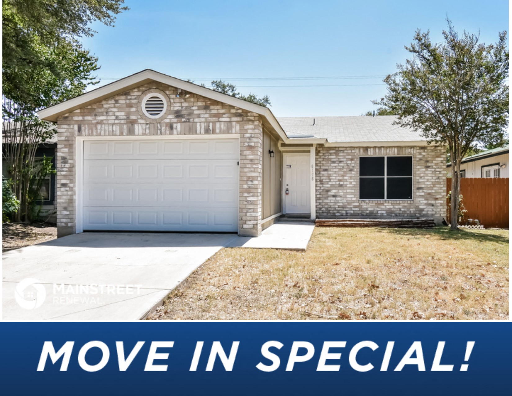 a house with a garage and a move in special