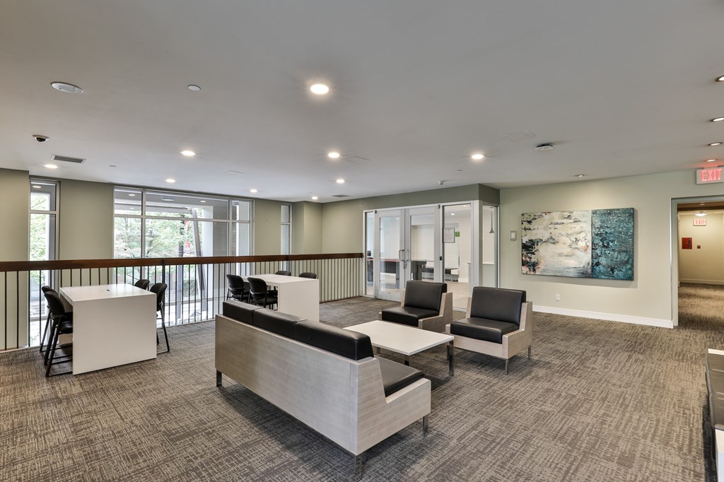 the preserve at cardinal courts resident lobby with couches and chairs
