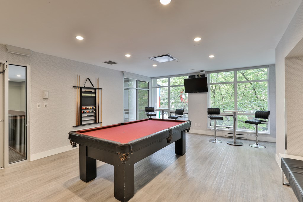 pool table in clubhouse at the estates apartments