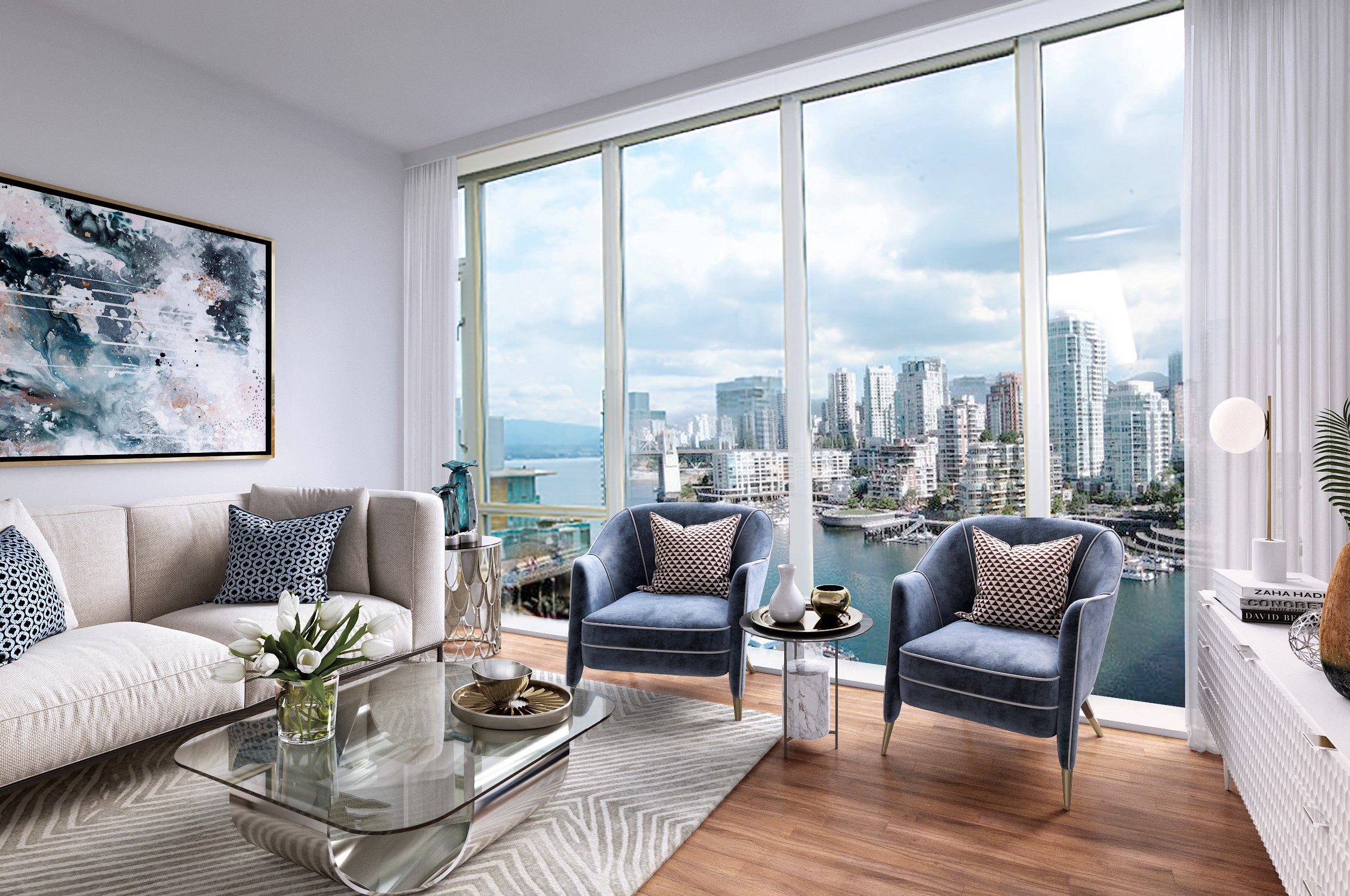 a living room with a view of the water and a couch and chairs