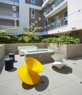 Outdoor courtyard with fire pit at Concourse, Los Angeles, CA, 90045