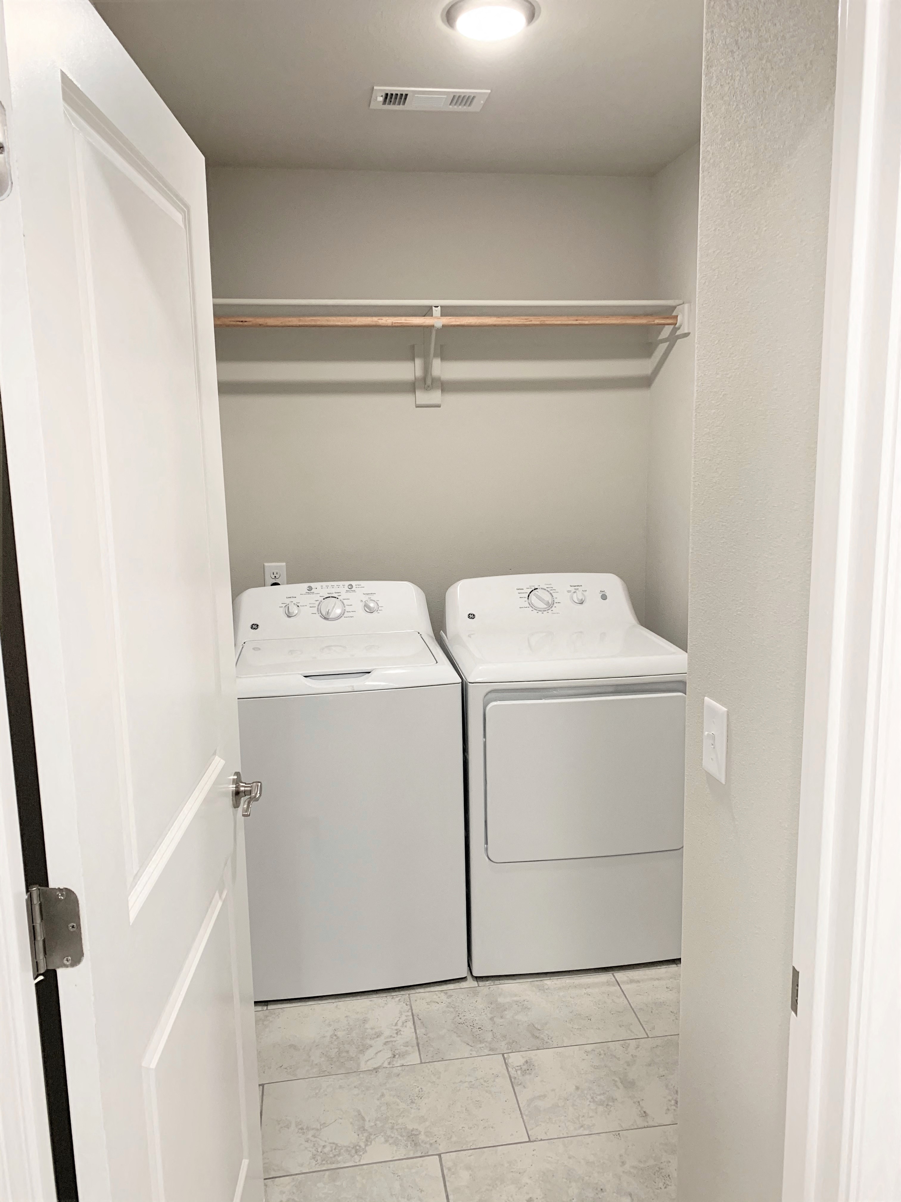 B2 (2-car) Laundry with side by side washer and dryer