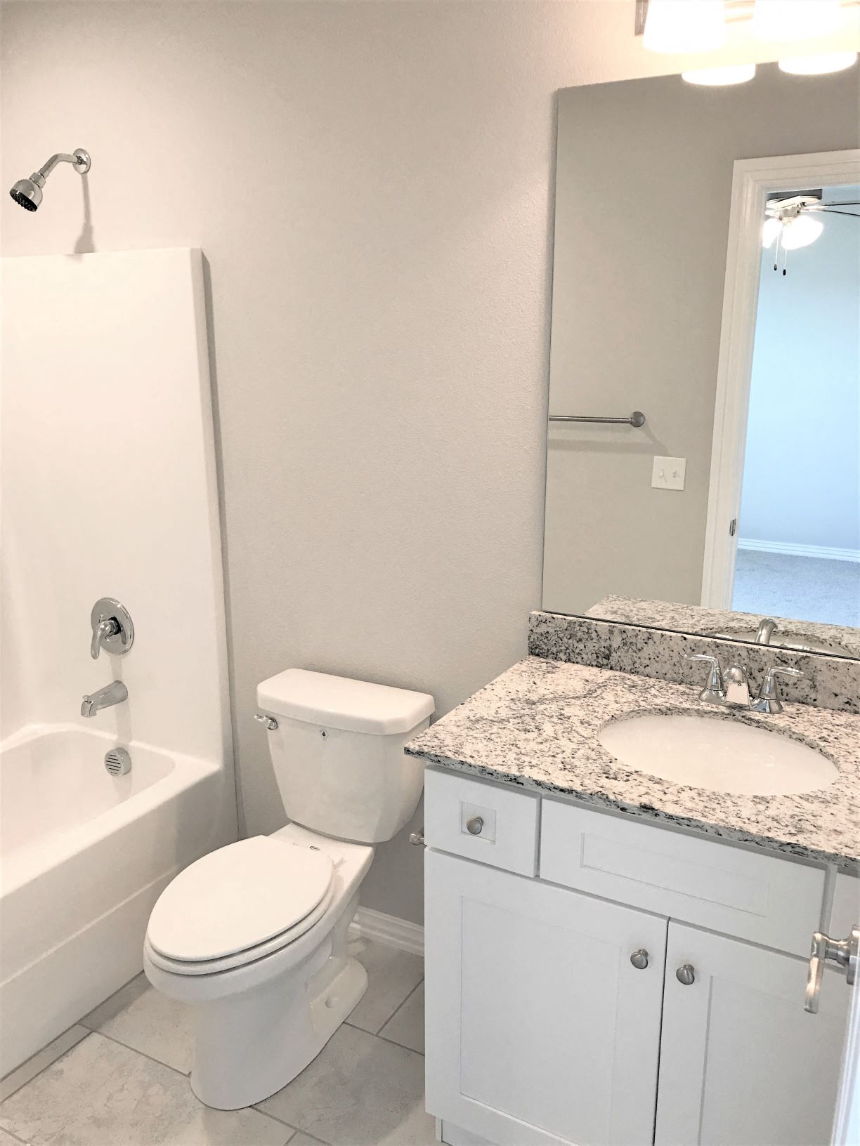 B3 (1-car) Guest Bath with granite countertops, sink, toilet, shower