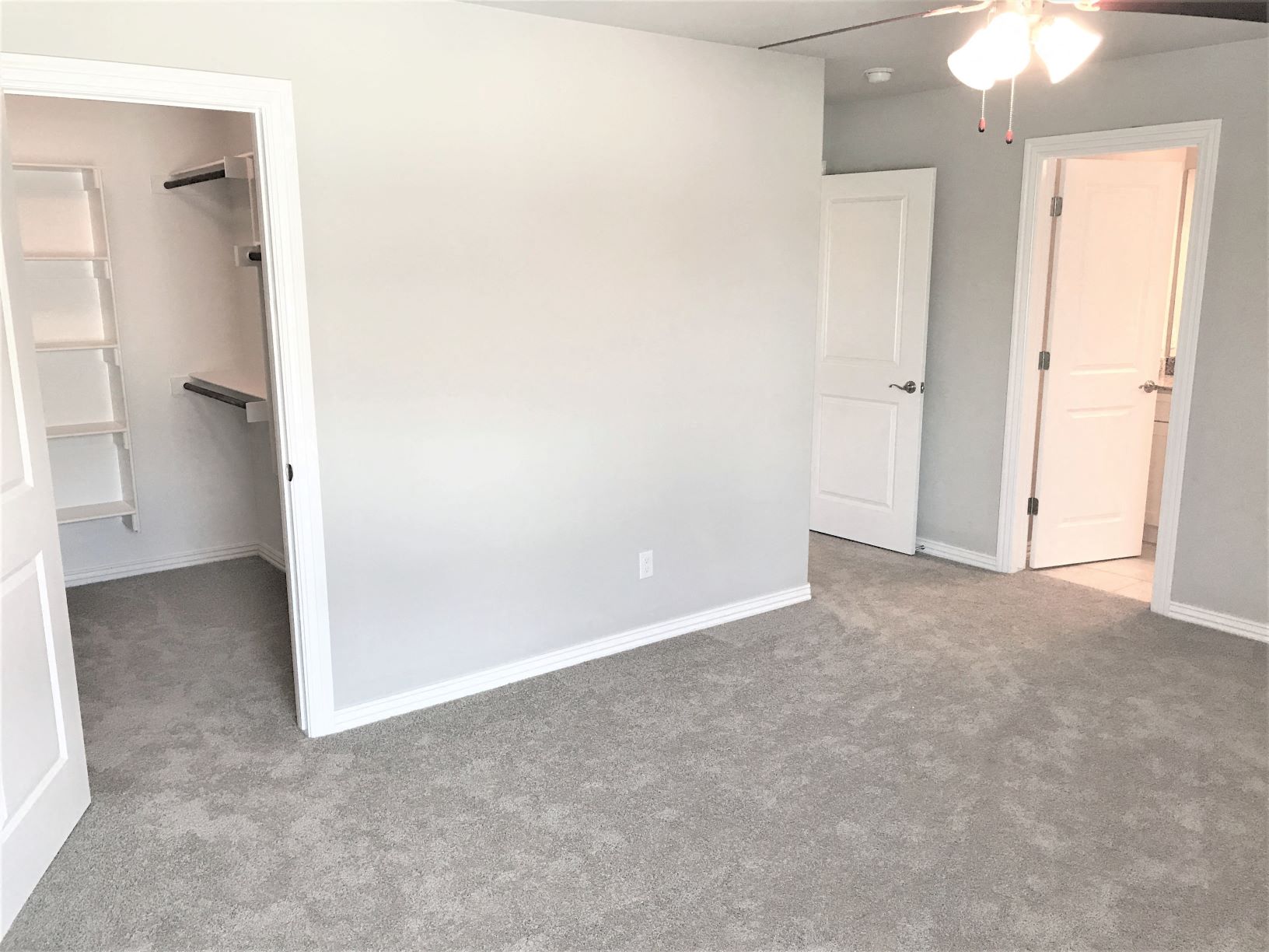 B3 (1-car) Master Bed carpeted facing closet