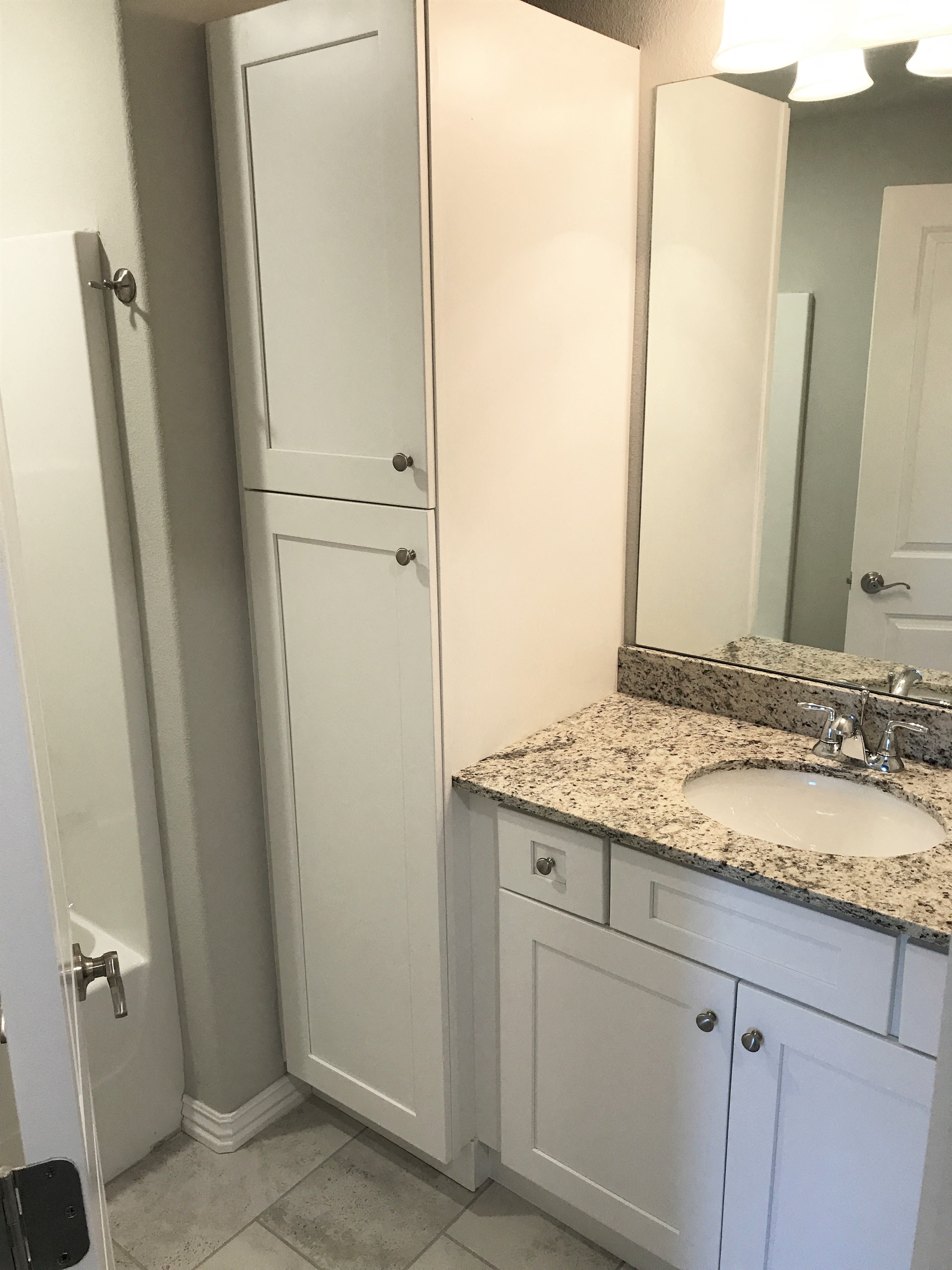 C1 (1-car) Guest Bath with pantry shelving