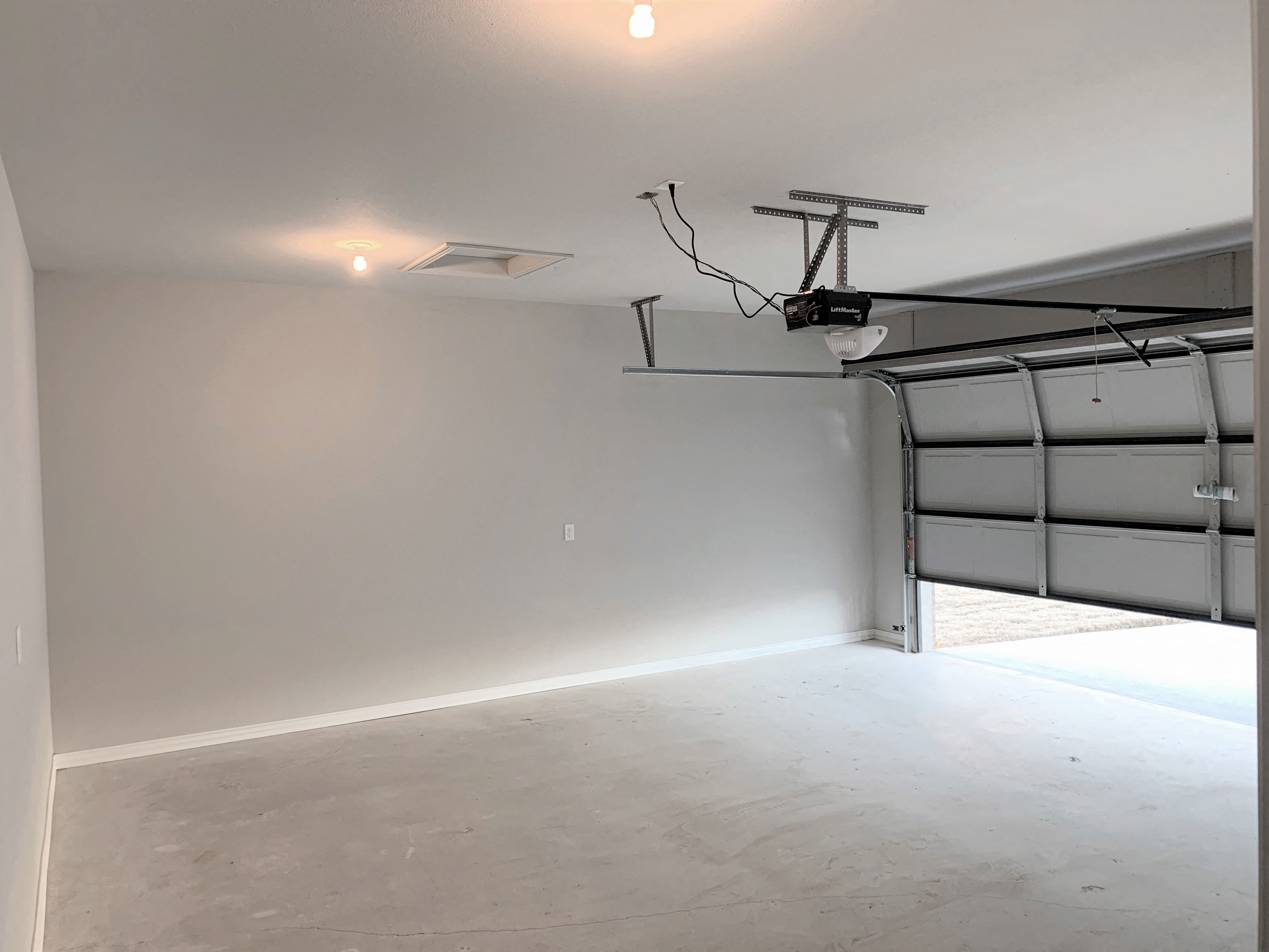 the living room is primed and ready for the painting of the garage doors