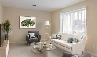 a living room with a couch and chairs and a table