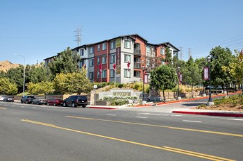 Exterior building from street view l Apartments For Rent in Slymar CA at Rockwood at the Cascades