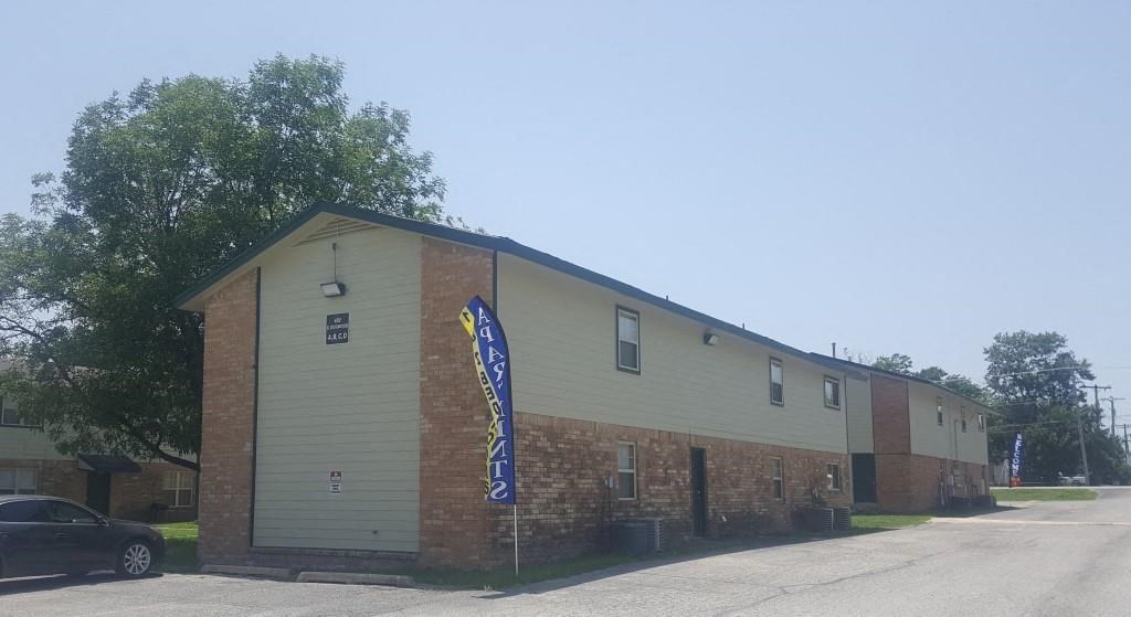 a building with a flag on the side of it