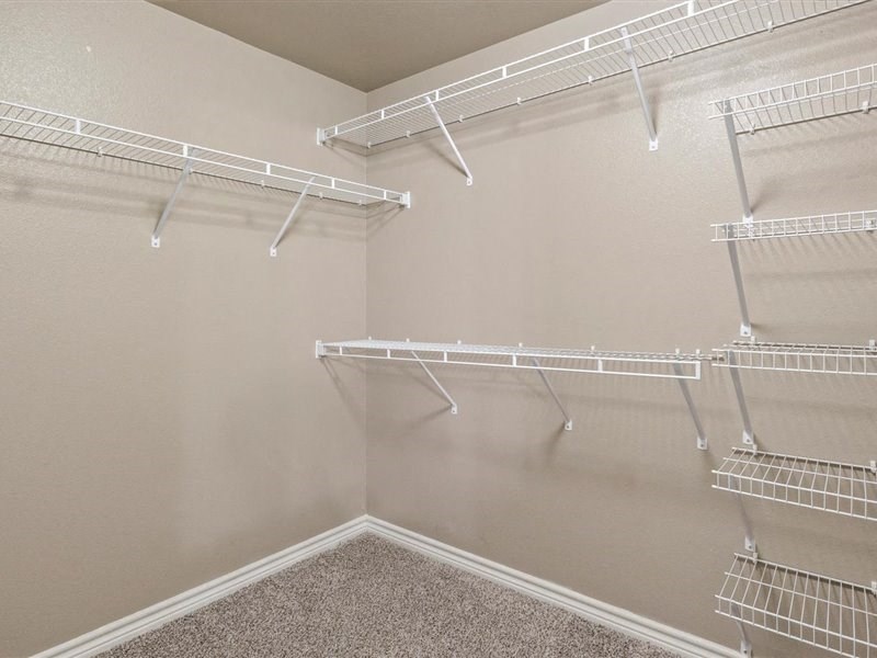 closet at Creed Canyon Apartments in Sherman TX