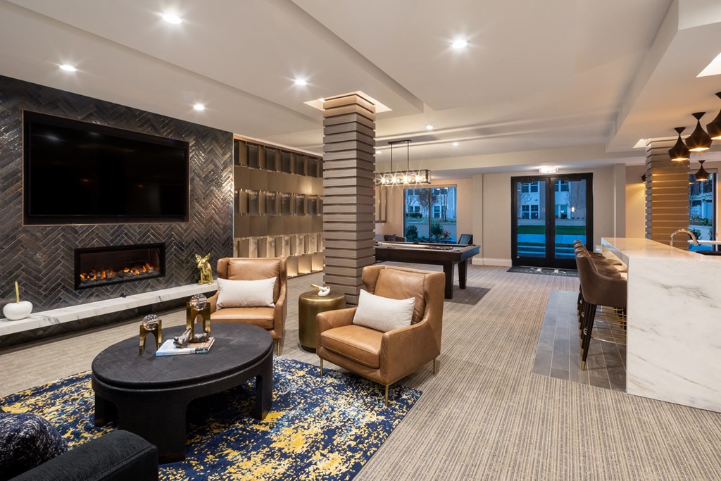 a large living room with a fireplace and a television