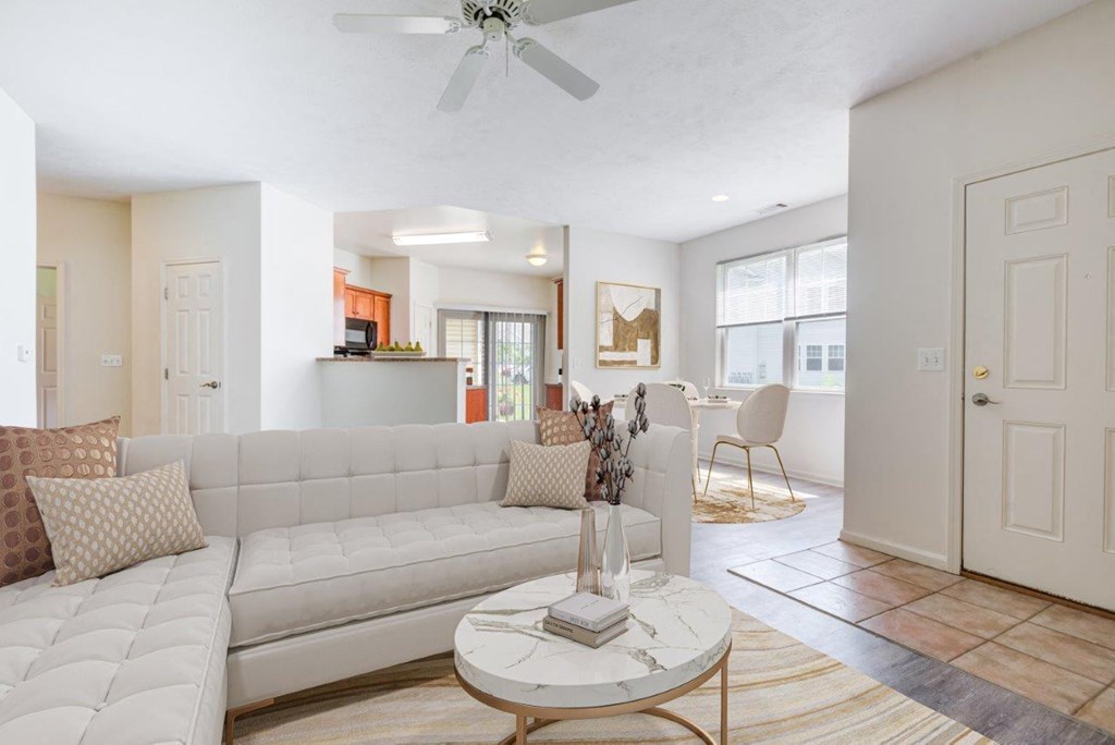 a living room with a couch and a table