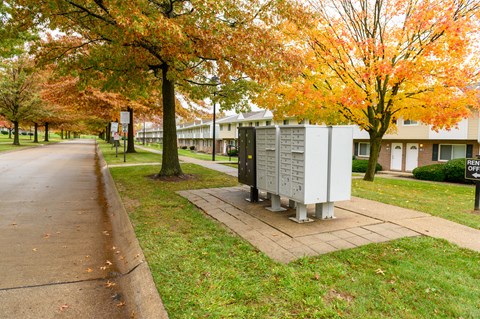 a utility box sitting on the side of a street
