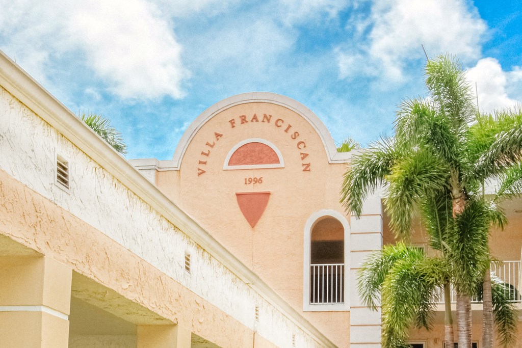 Logo and name on exterior of Villa Franciscan