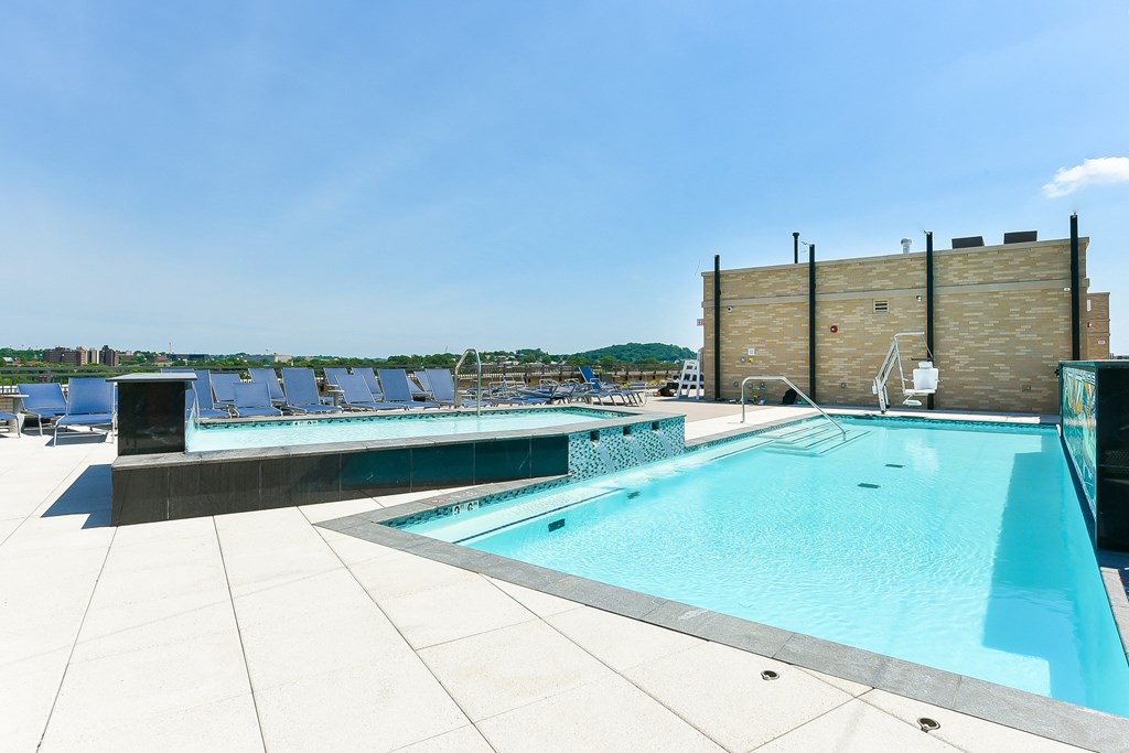 a swimming pool on the roof of a building