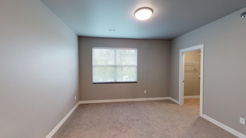 bedroom window and closet
