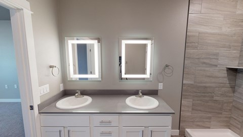 bathroom, dual vanity, lighted mirror