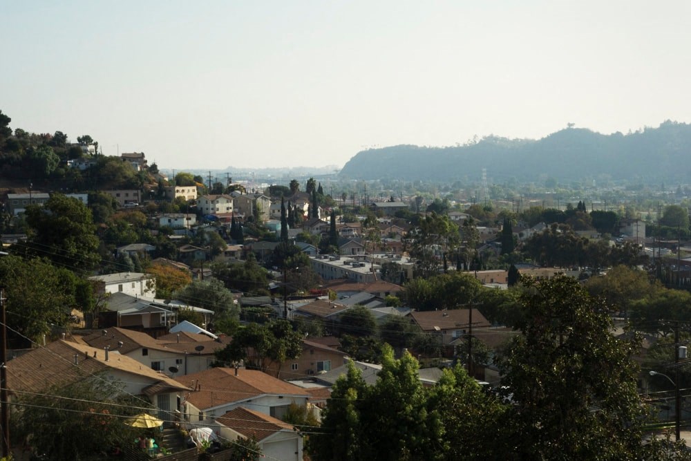 a view of the city from a hill