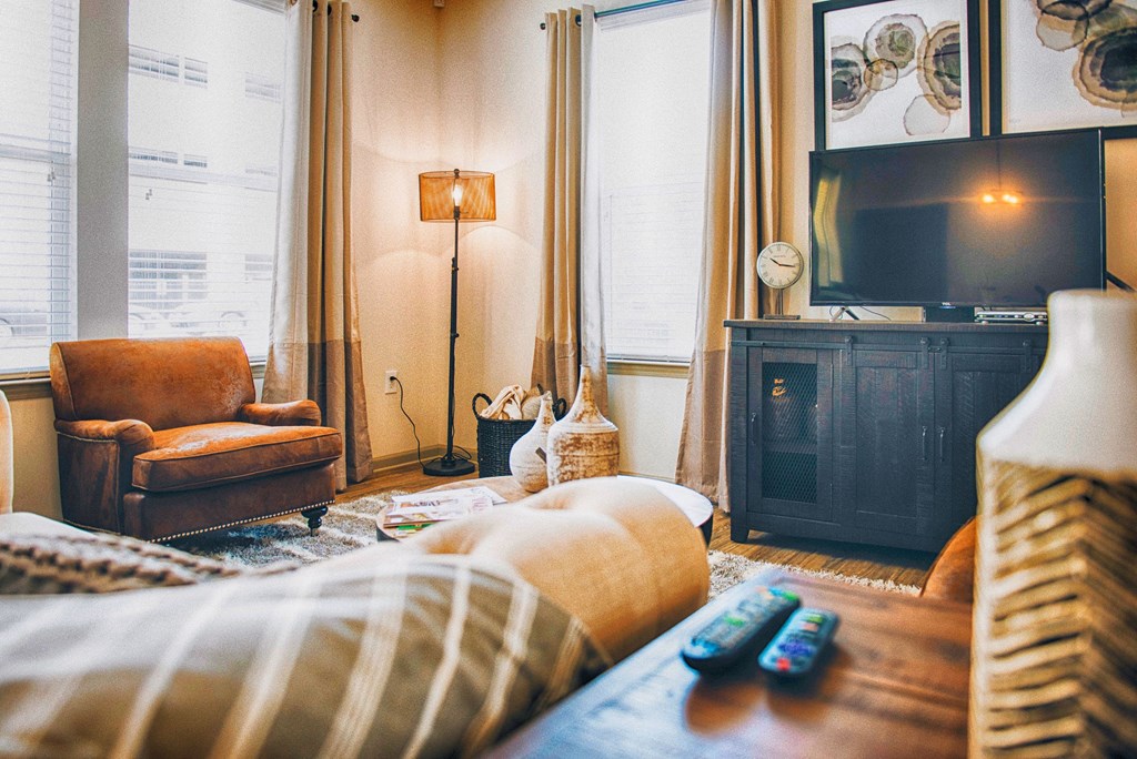 a living room with a couch and a tv