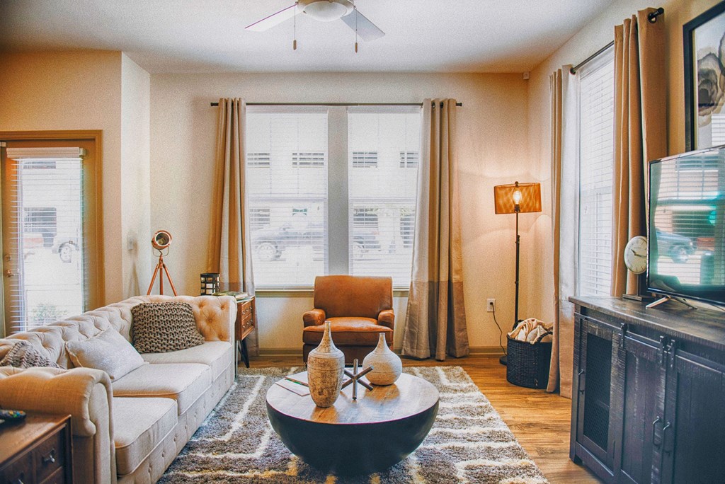 a living room with a couch and a coffee table