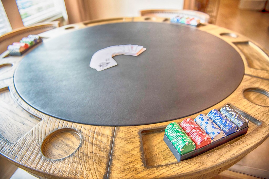a table with a game of monopoly on top of it