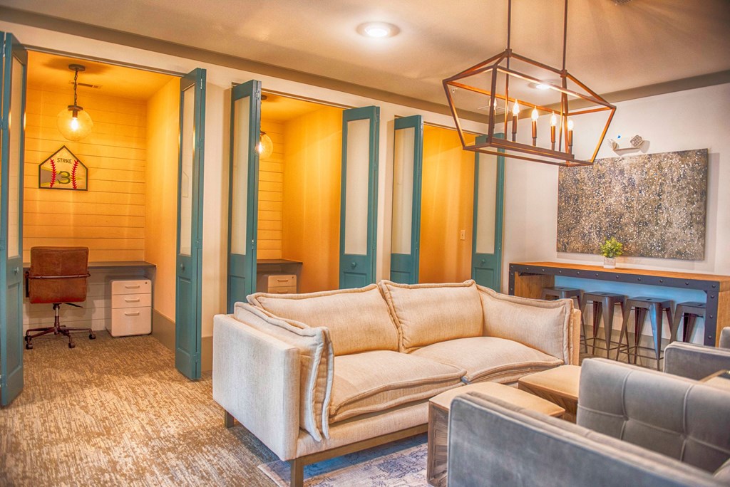 a living room with blue and yellow walls and a couch