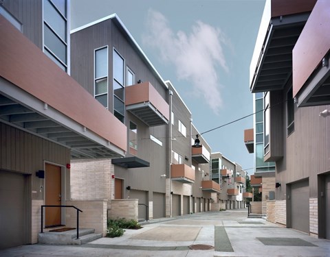A modern residential area with buildings and walkways.
