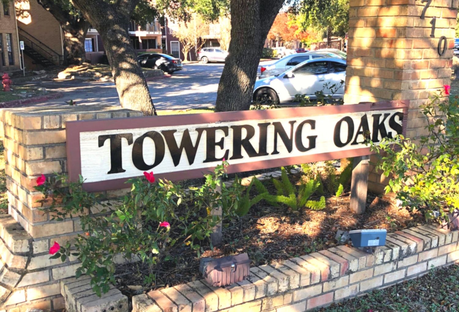 Community Sign surrounded by plants