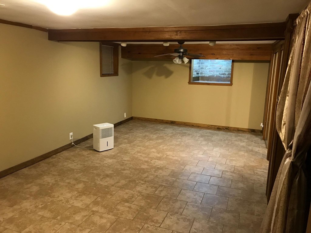 the living room is ready for us to move in and install a new floor