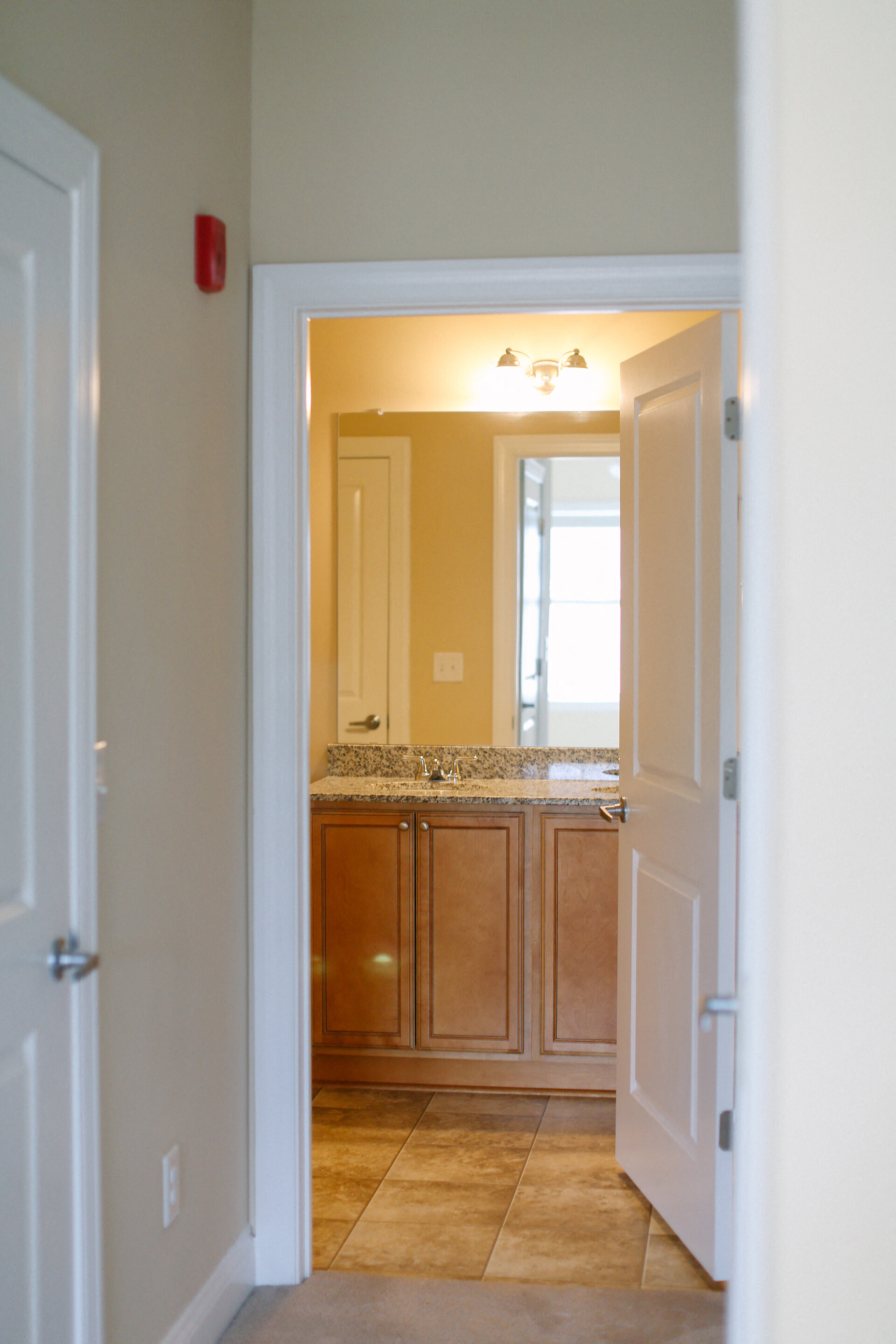 a view of the bathroom from the living room