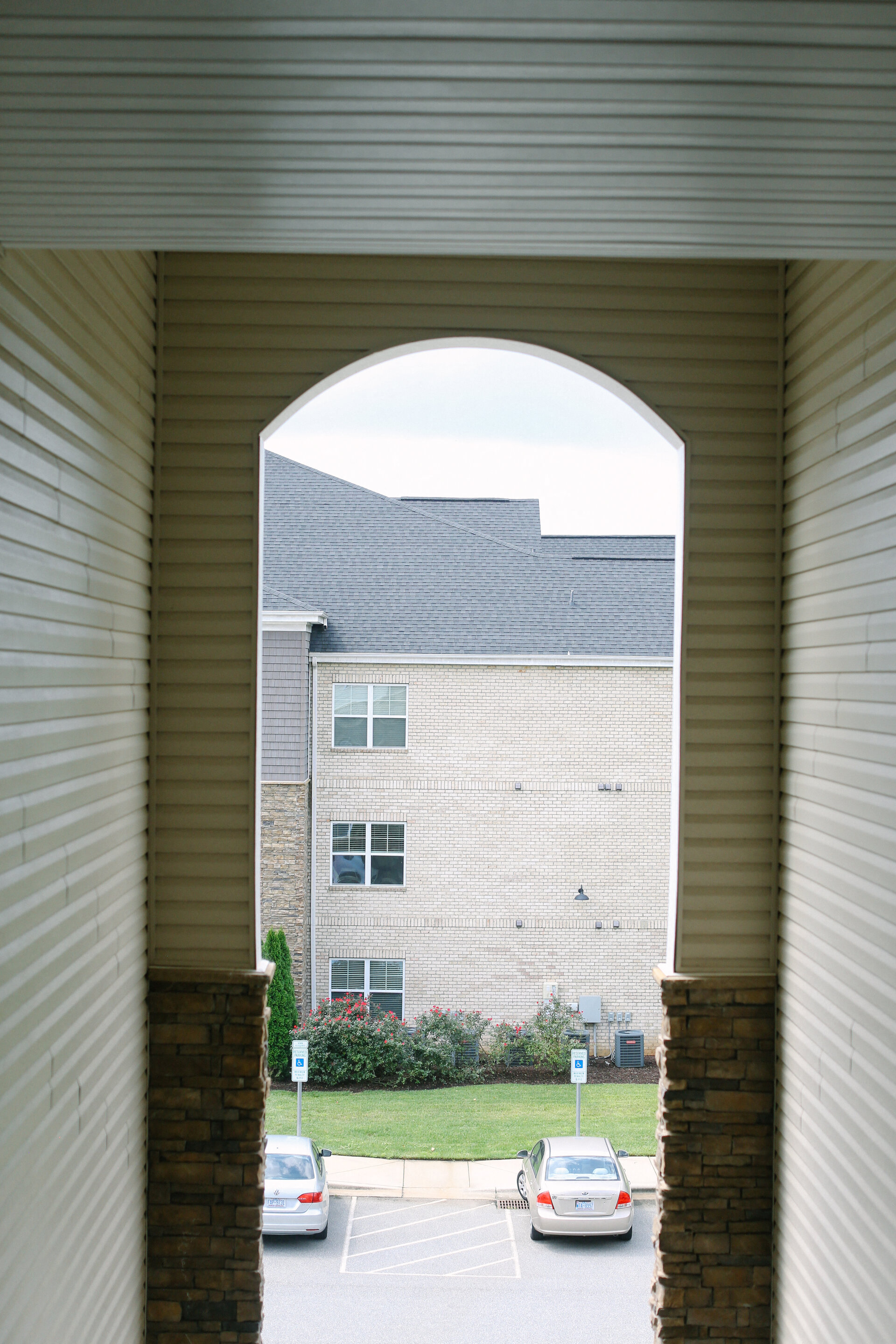 a view of a building from a parking garage