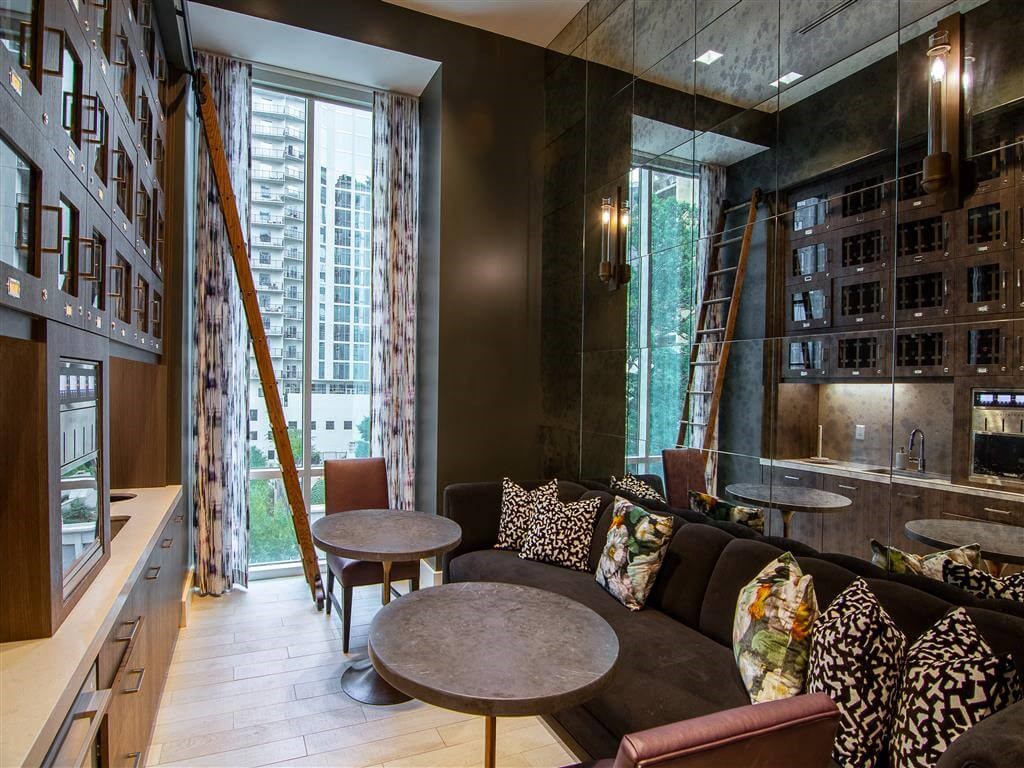 a living room with a couch and tables