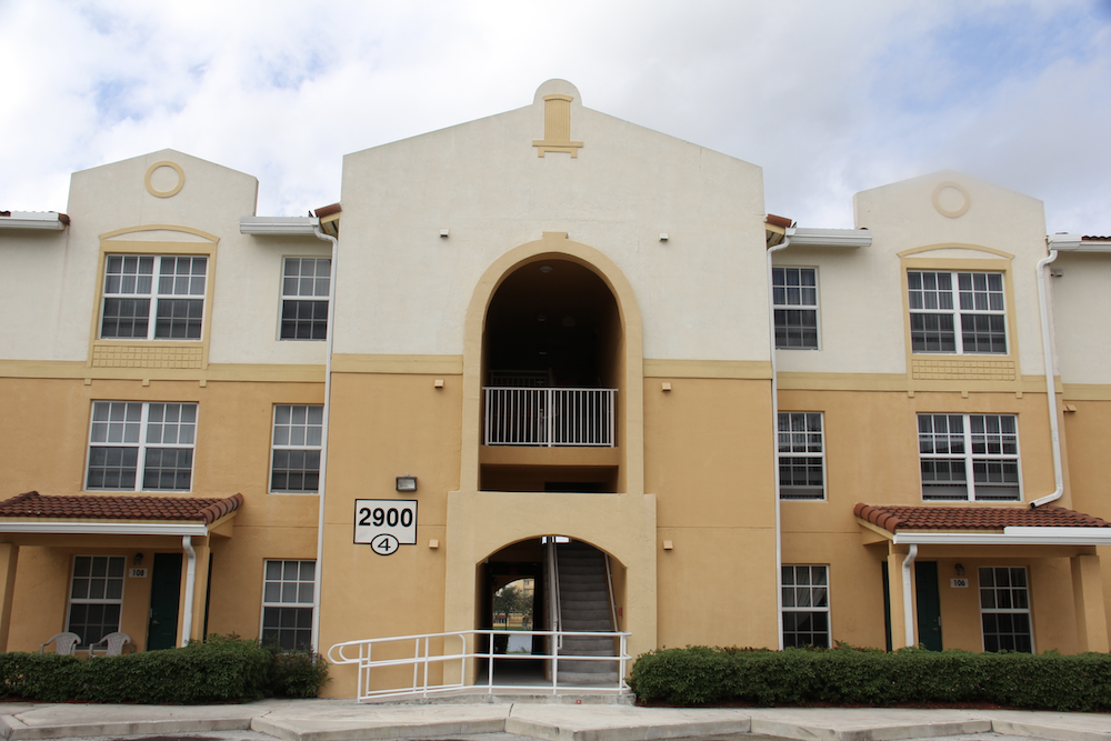 well-kept walkways, breezeways, and facades at Crystal Lake apartments