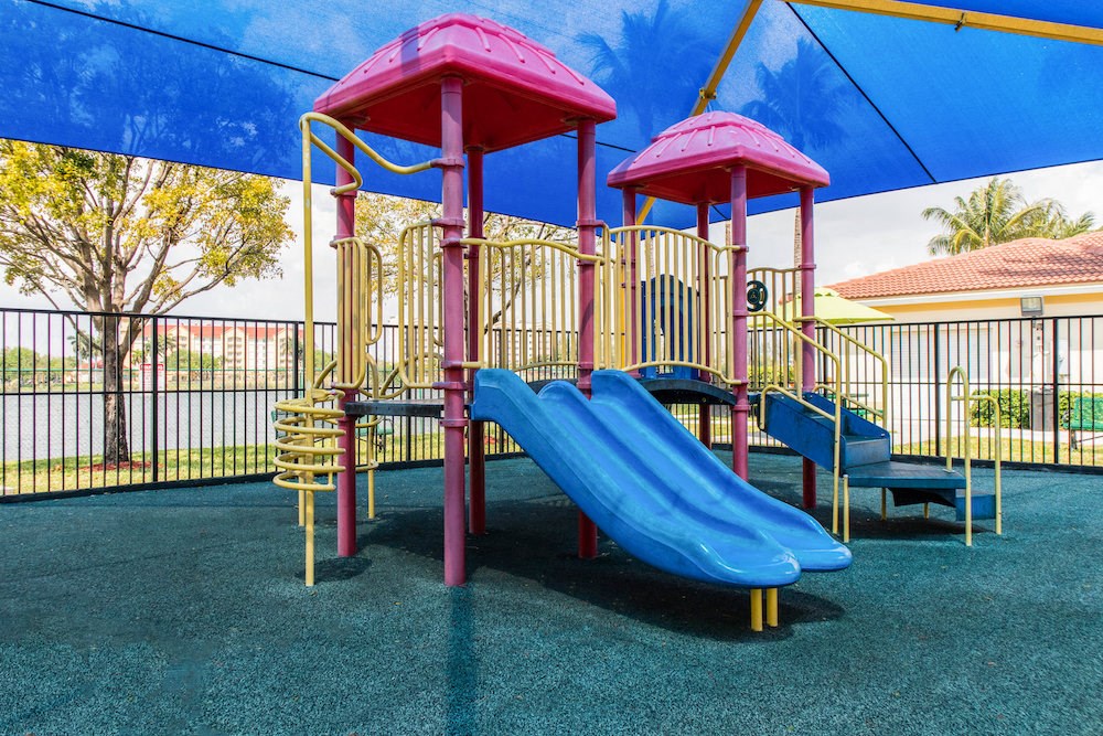 modern covered playground at Crystal Lake Apartments
