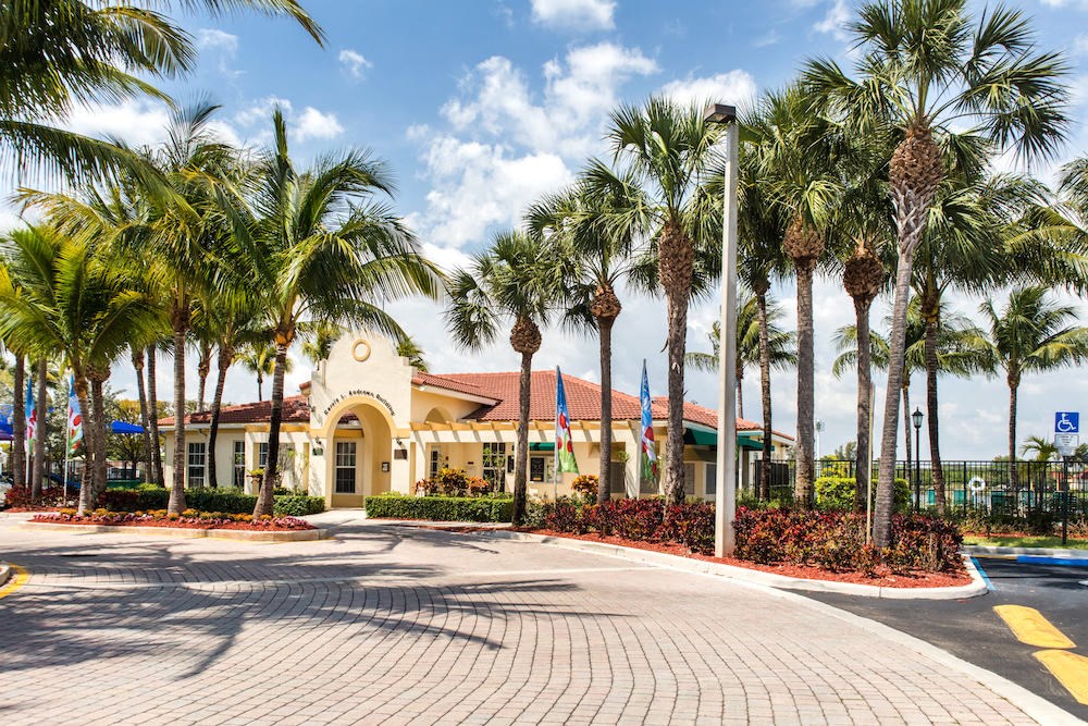 lush landscaping beautifies Crystal Lake Apartments in Hollywood, FL