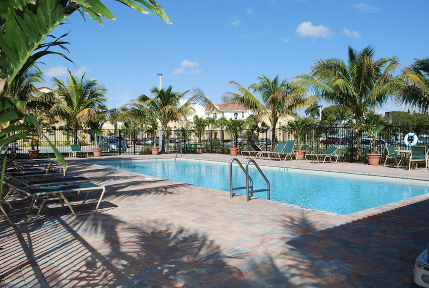 sparkling pool and sundeck at Crystal Lake in Hollywood, FL - Photo Gallery 1