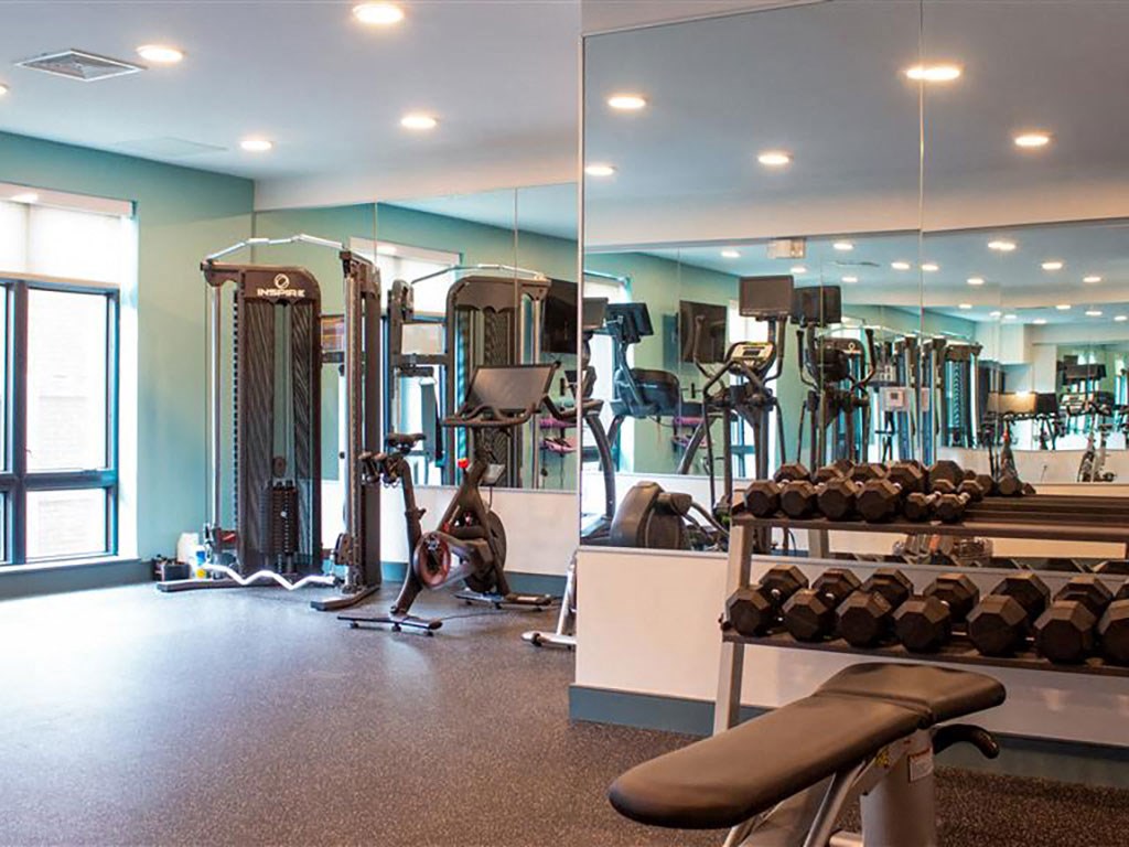 Beverly MA Apartments - Holmes Beverly -State-Of-The-Art Fitness Center with Equipment, Weights, Machines, and Large Mirrors