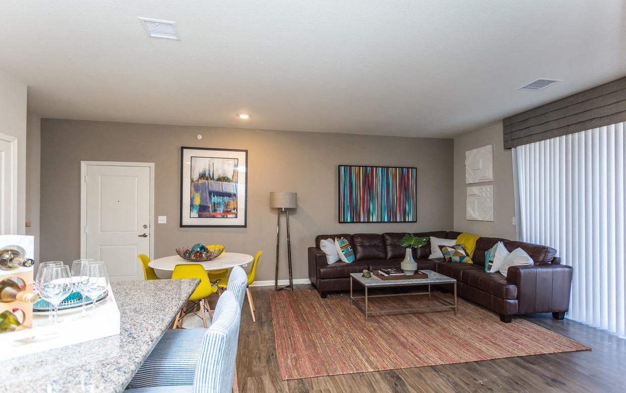 a living room with a couch and a table