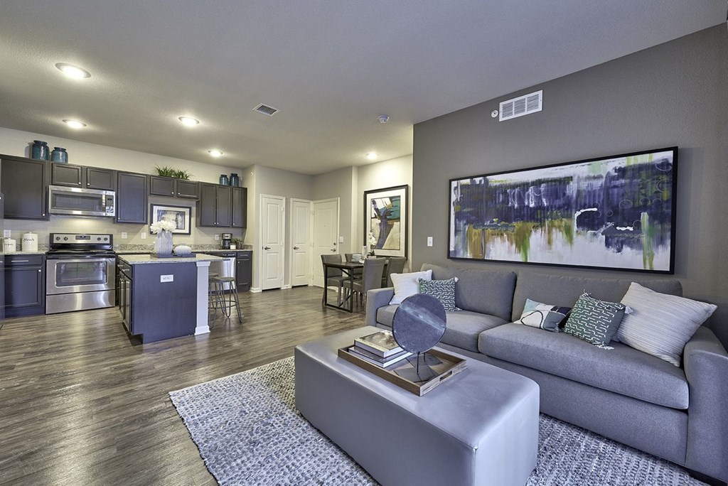 a living room with a couch and a table