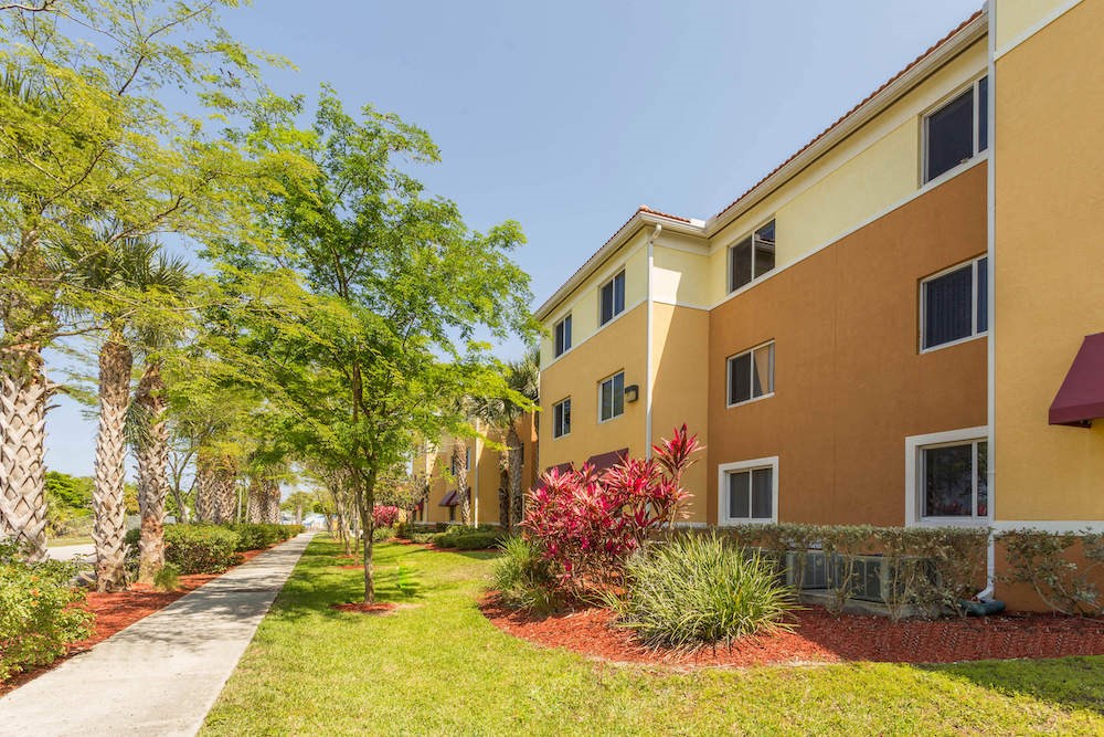 neatly manicured landscaping at our income-restricted apartments