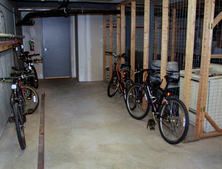 a group of bikes parked in a garage