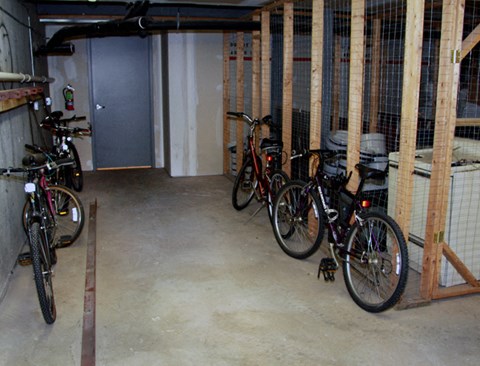 a group of bikes parked in a garage