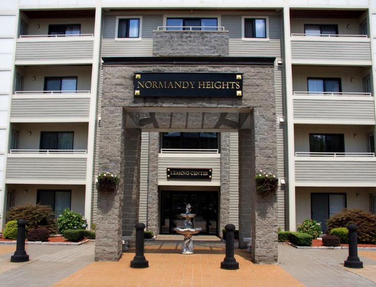 a building with a fountain in front of it