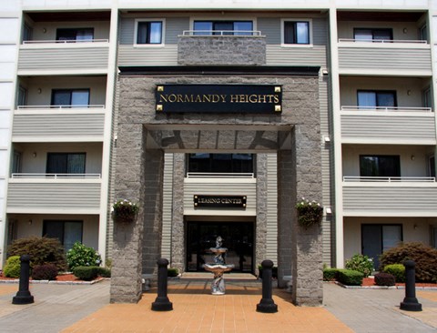 a building with a fountain in front of it