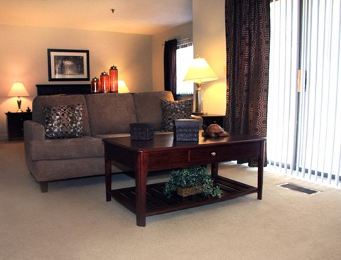 a living room with a couch and a table