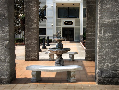 a fountain in front of a building
