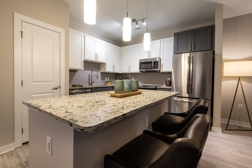 A Kitchen With Refrigerator at The Aster Apartments, Cary, 27519