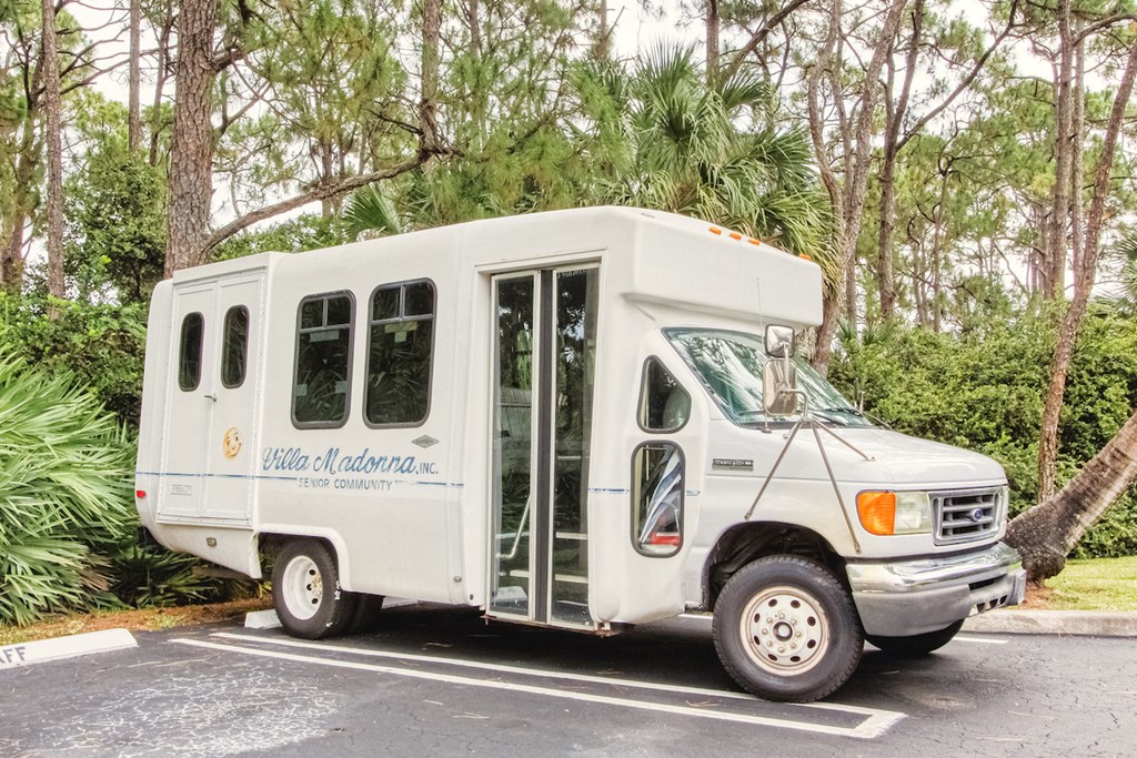 Transport Shuttle parked in lot at Villa Madonna